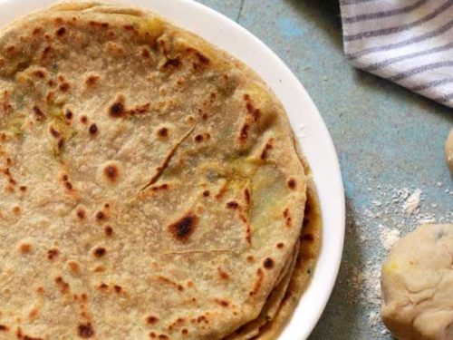 If the stuffed paratha bursts while rolling, follow these cooking hacks, every bite will be crispy and tasty.